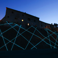 Relational, 2010, Electroluminescent Cable, Installation view on the medieval walls and turret of Castelbasso (Teramo) (IT).