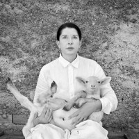 Marina Abramović Portrait with White Lamb from the series Back to Simplicity C- Print 125 x 125 cm 2010  © Marina Abramović by SIAE 2012, courtesy Marina Abramović and Galleria Lia Rumma, Milan.
