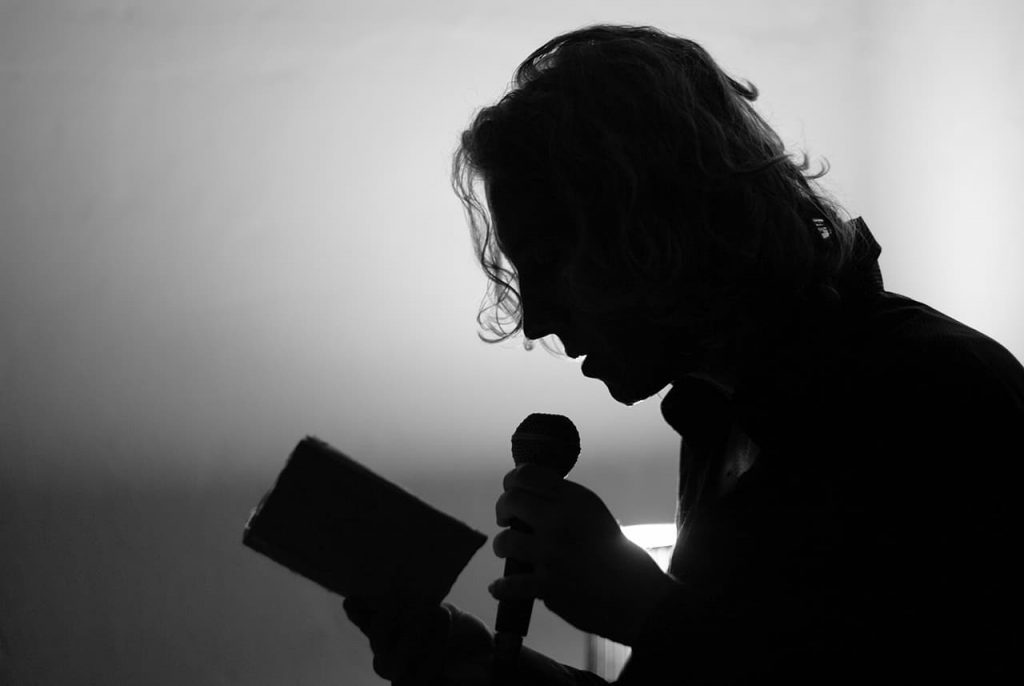 immagine per Domenico Mennillo durante il poema-concerto Opus Infectum, Lanificio, Napoli 2010