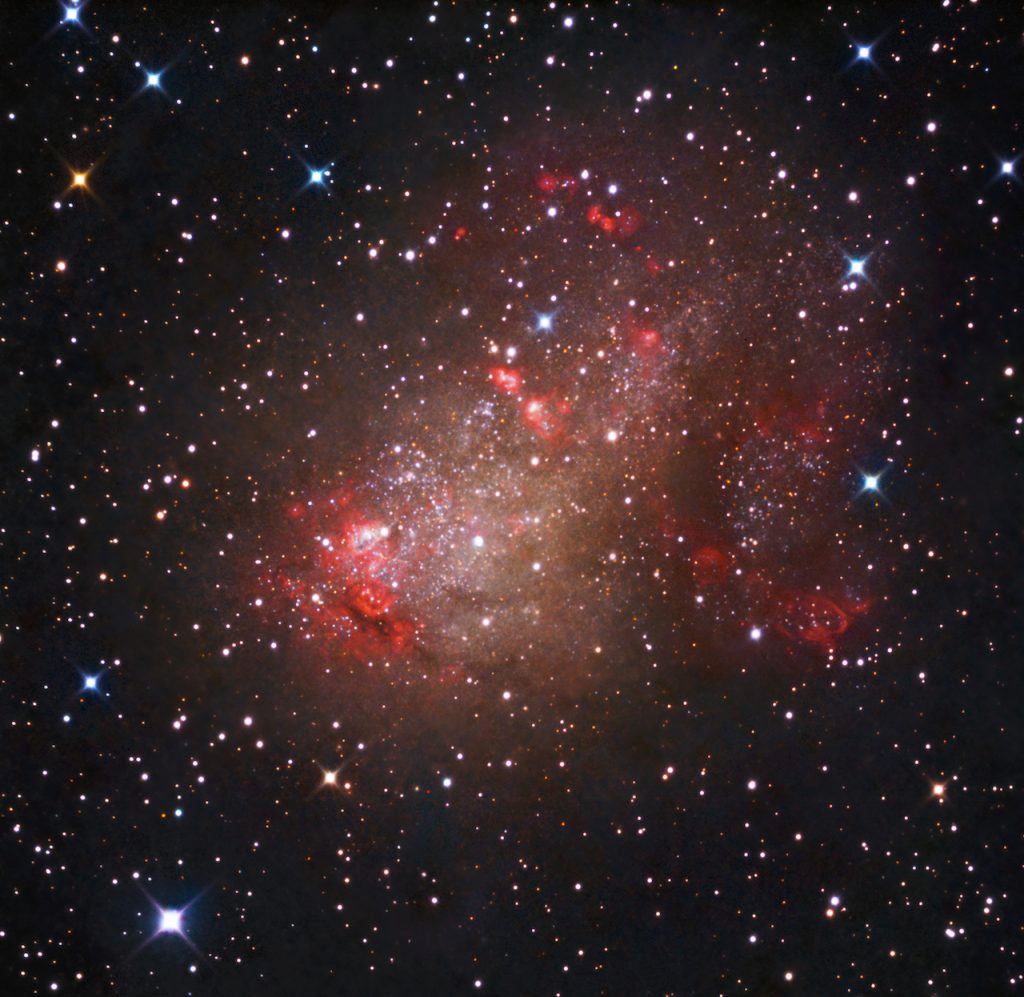immagine per 3. La galassia irregolare IC 10, a circa 2,2 milioni di anni luce dalla Terra.The irregular galaxy IC 10, about 2.2 million light years from Earth.Crediti: LRS/TNG; D. del Nero Festa Nobre