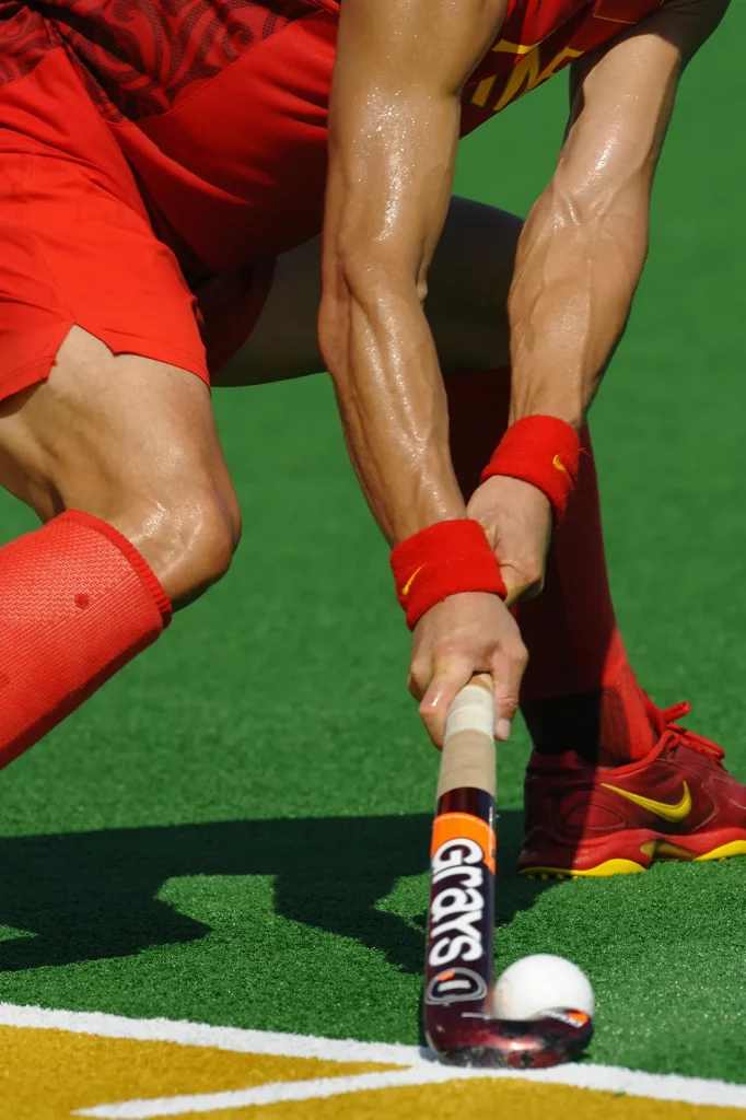 immagine per Hélène Tobler. Beijing 2008 Olympic Games, Men's Hockey - China (CHN) 11th - South Africa (RSA) 12th, detail of a player. Courtesy of the artist / International Olympic Committee (IOC).
