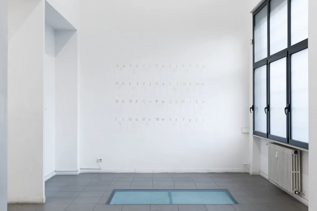 immagine per Abbecedario del linguaggio muto carcerario, 2023, 28 drawings, graphite on paper, 160×205 cm, photo Eleonora Cerri Pecorella