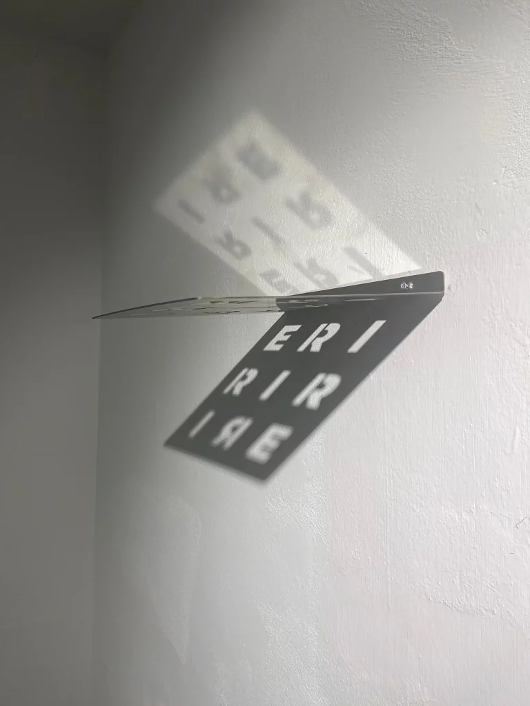 immagine per Saghar Daeiri They were alive but they tought they were evil installation 2 2025 metal and light 25x25x1 cm.