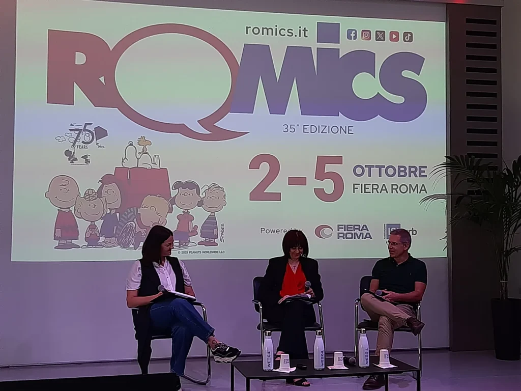 immagine per Conferenza stampa presentazione XXXV edizione Romics. Sullo sfondo il manifesto con i Peanuts Conferenza stampa presentazione XXXV edizione Romics. Sullo sfondo il manifesto con i Peanuts