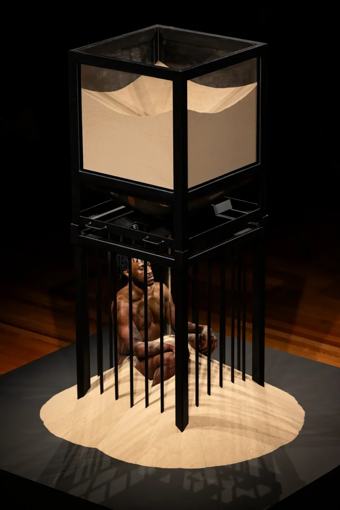 immagine per Carlos Martiel, Custody (Bajo custodia), 2025. Dark Mofo, City Hall, Nipaluna/Hobart, Lutruwita/Tasmania, Australia. print. . Photographic Photo by Jesse Hunniford Courtesy of the artist.